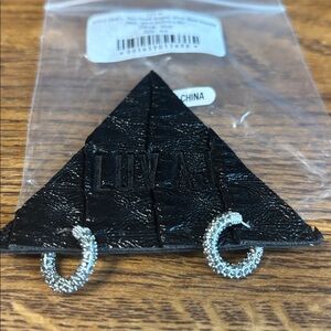 LUV AJ.  Silver Black Diamond Huggie earrings